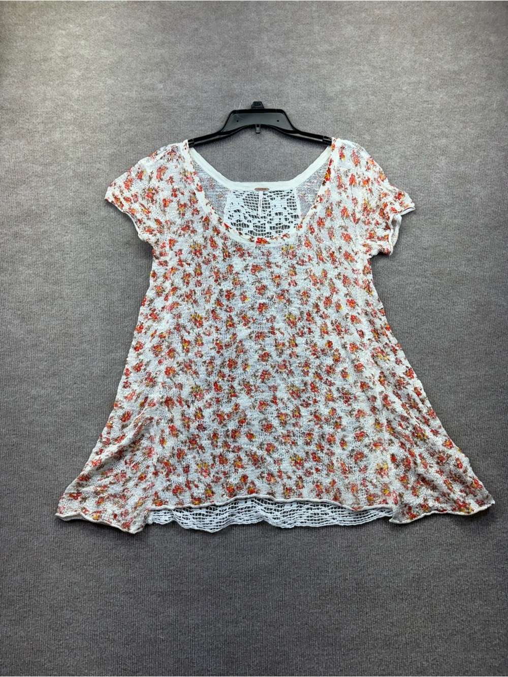 Free People white floral semi-sheer knit top featuring a delicate contrast croch